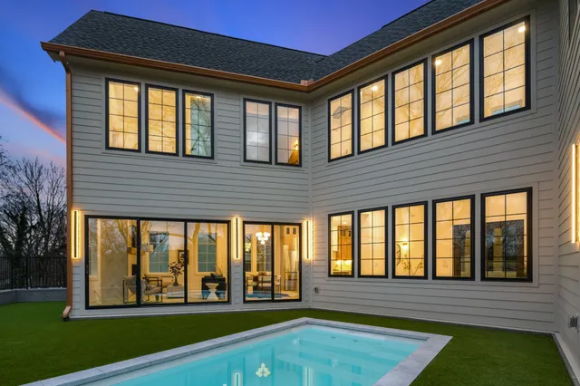 a bathroom with a double vanity sink and mirror