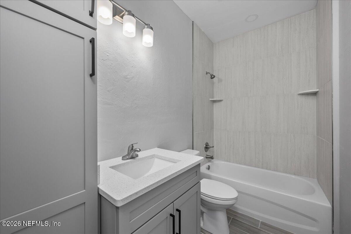 108 Pamela Street Interlachen, FL 32148 - Photo 17 of 31 a bathroom with a sink toilet and shower