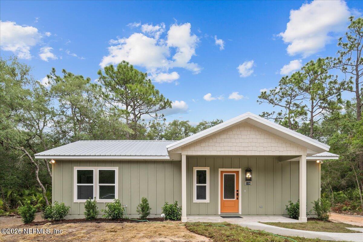 108 Pamela Street Interlachen, FL 32148 - Photo 2 of 31 a front view of a house with a yard