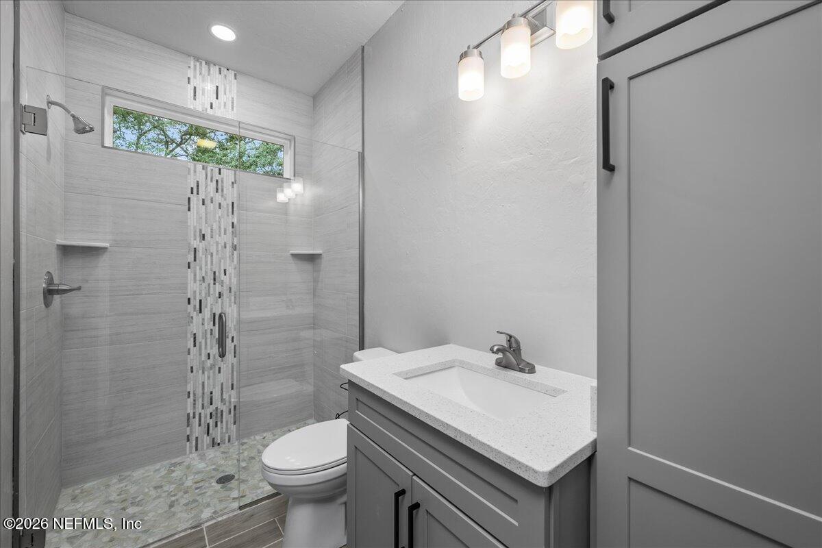108 Pamela Street Interlachen, FL 32148 - Photo 23 of 31 a bathroom with a sink toilet and shower