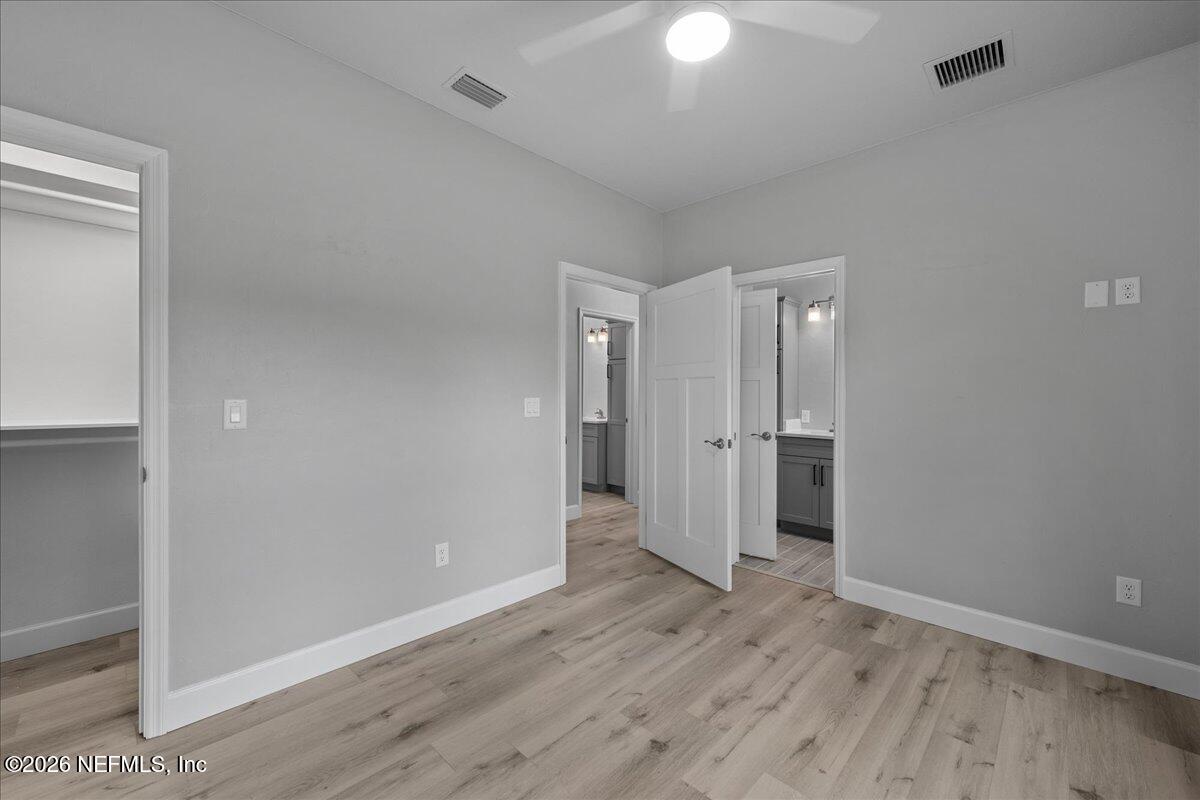 108 Pamela Street Interlachen, FL 32148 - Photo 25 of 31 a view of an empty room with wooden floor