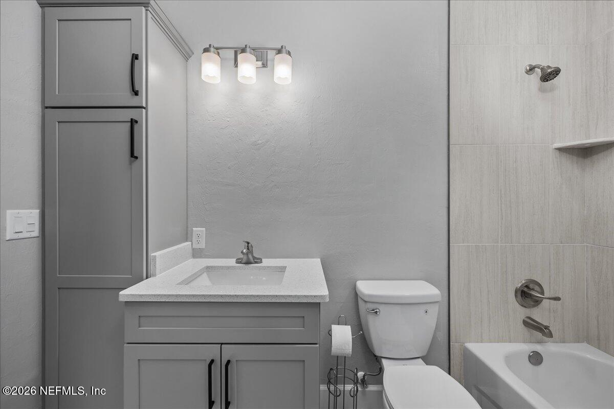 108 Pamela Street Interlachen, FL 32148 - Photo 26 of 31 a bathroom with a sink a toilet and shower