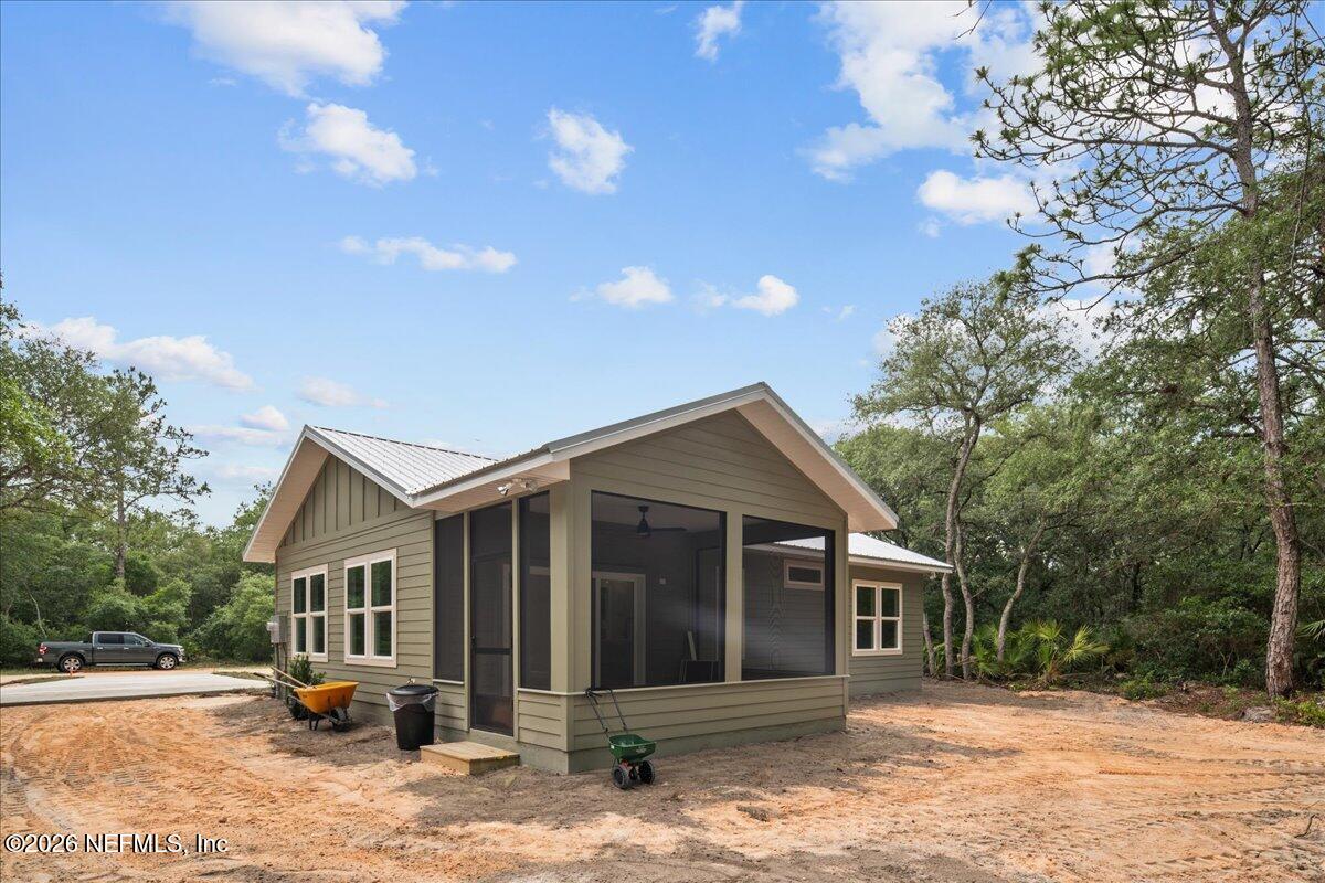 108 Pamela Street Interlachen, FL 32148 - Photo 6 of 31 a front view of a house with a yard