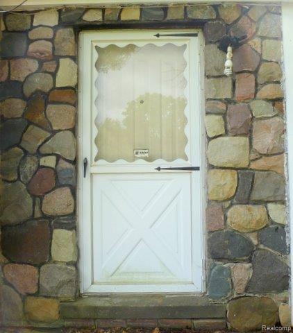 48733 9 9 Mile Road Northville, MI 48167 - Photo 3 of 17 Front Door-9 MIle