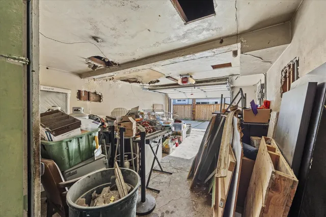a view of a house with outdoor seating