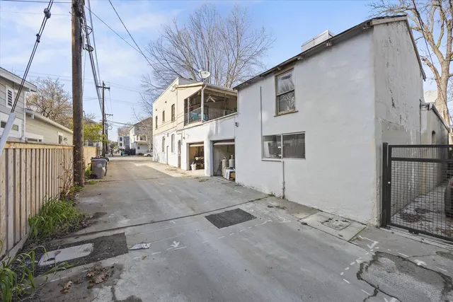 a view of a street with big house