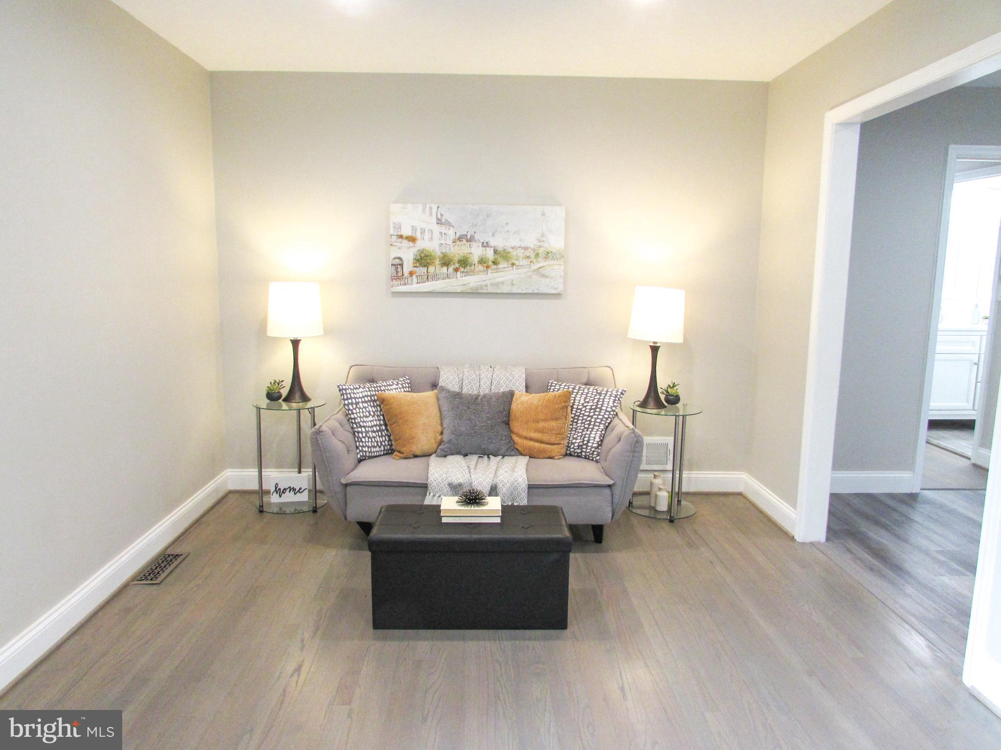 4729 Roundhill Road Ellicott City, MD 21043 - Photo 13 of 48 TOP LEVEL LIVING/DINING ROOM AREAS