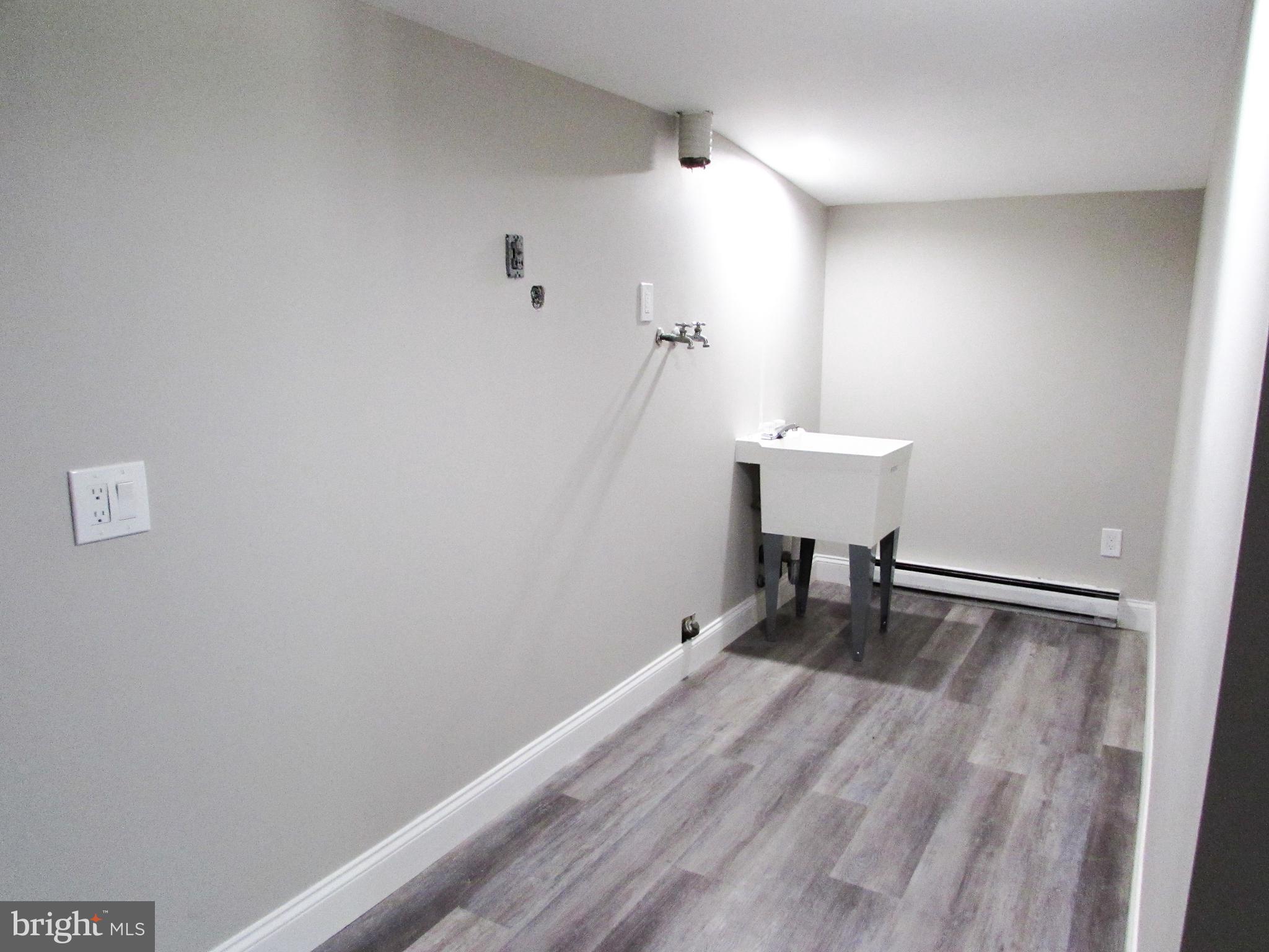 4729 Roundhill Road Ellicott City, MD 21043 - Photo 36 of 48 LAUNDRY ROOM OFF MASTER SUITE