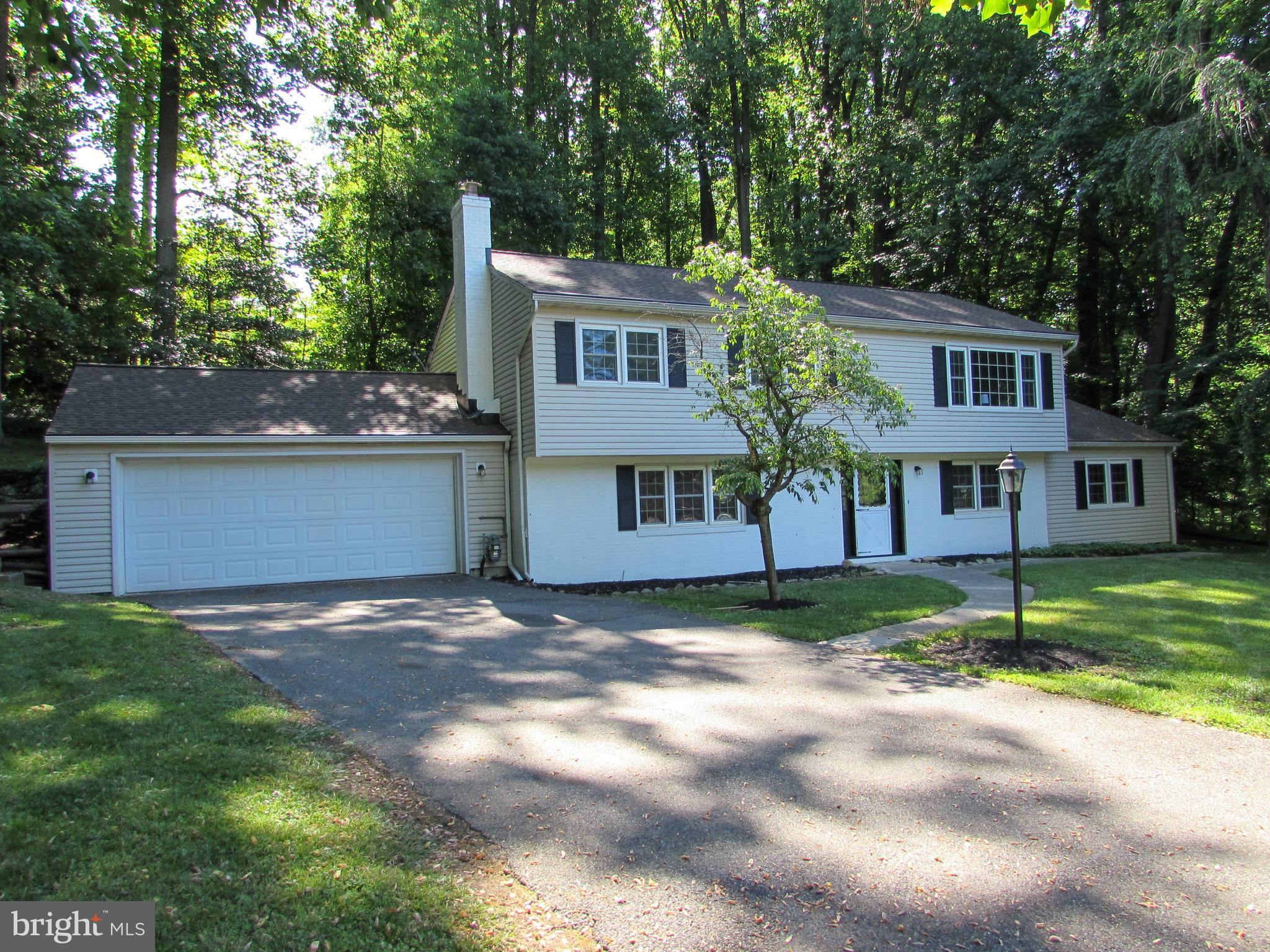 4729 Roundhill Road Ellicott City, MD 21043 - Photo 39 of 48 PRIVATE WOODED LOT SIDING TO COMMUNITY STREAM