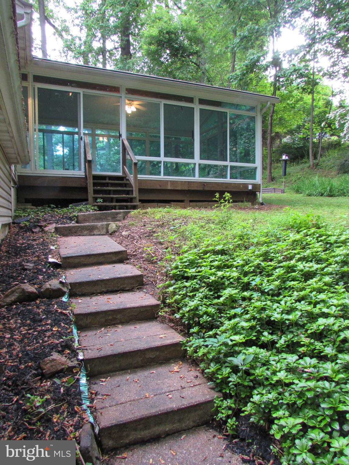 4729 Roundhill Road Ellicott City, MD 21043 - Photo 47 of 48 STEPS TO THE SUNROOM