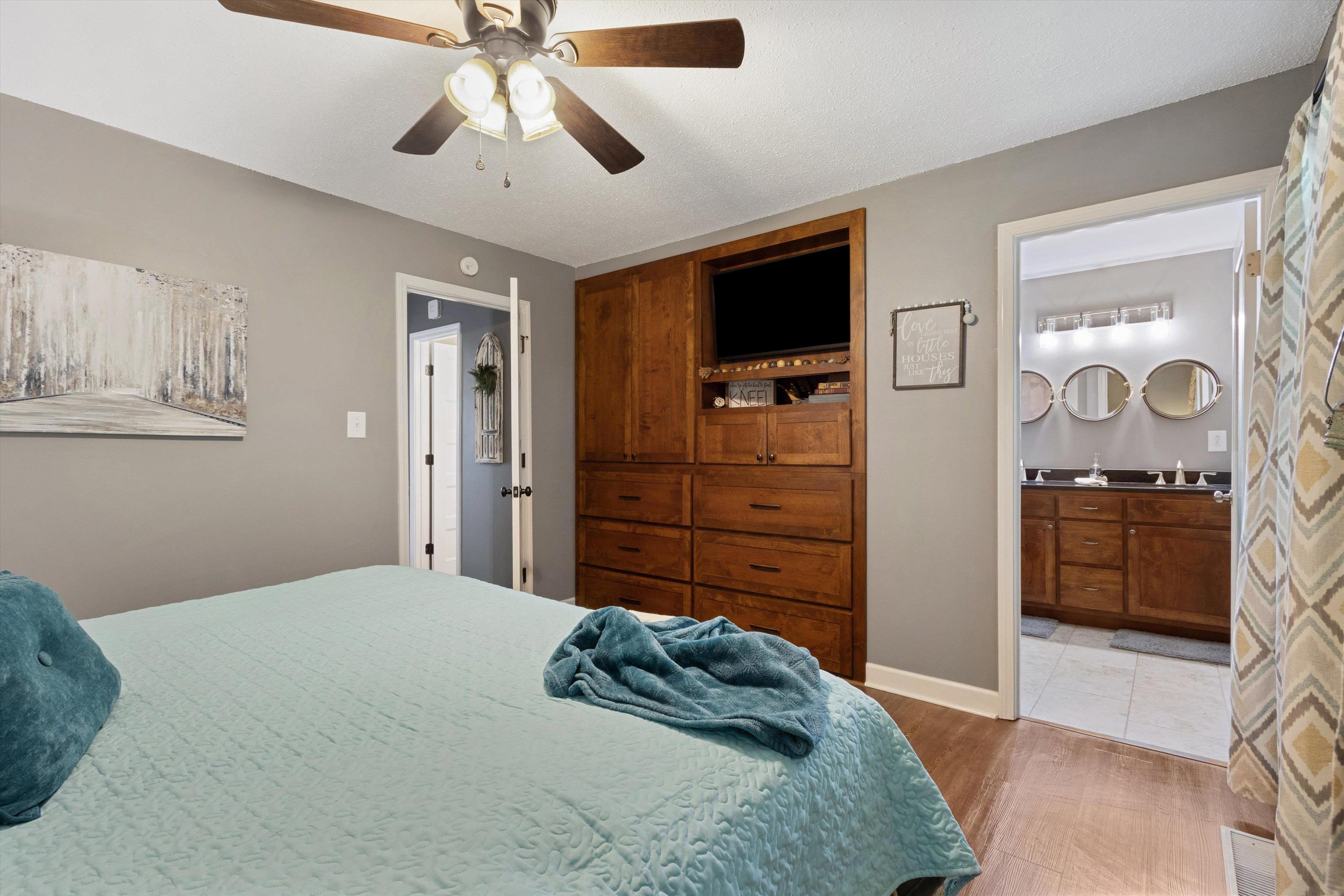 4500 Drummonds Road Drummonds, TN 38023 - Photo 12 of 29 a bedroom with a bed and a dresser