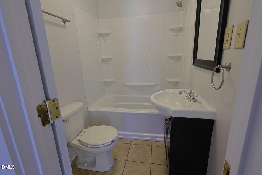 536 Oakgrove Road Asheboro, NC 27205 - Photo 14 of 36 a bathroom with a sink toilet and shower