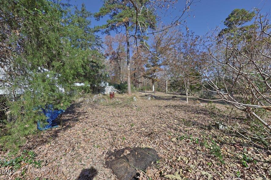 536 Oakgrove Road Asheboro, NC 27205 - Photo 30 of 36 a backyard of a house with lots of green space
