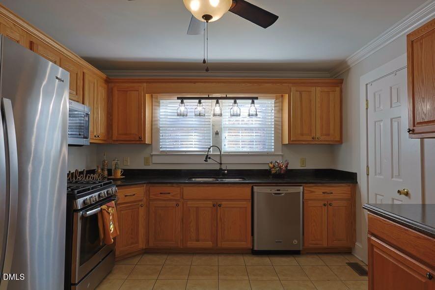 536 Oakgrove Road Asheboro, NC 27205 - Photo 8 of 36 a kitchen with stainless steel appliances granite countertop a sink stove and refrigerator
