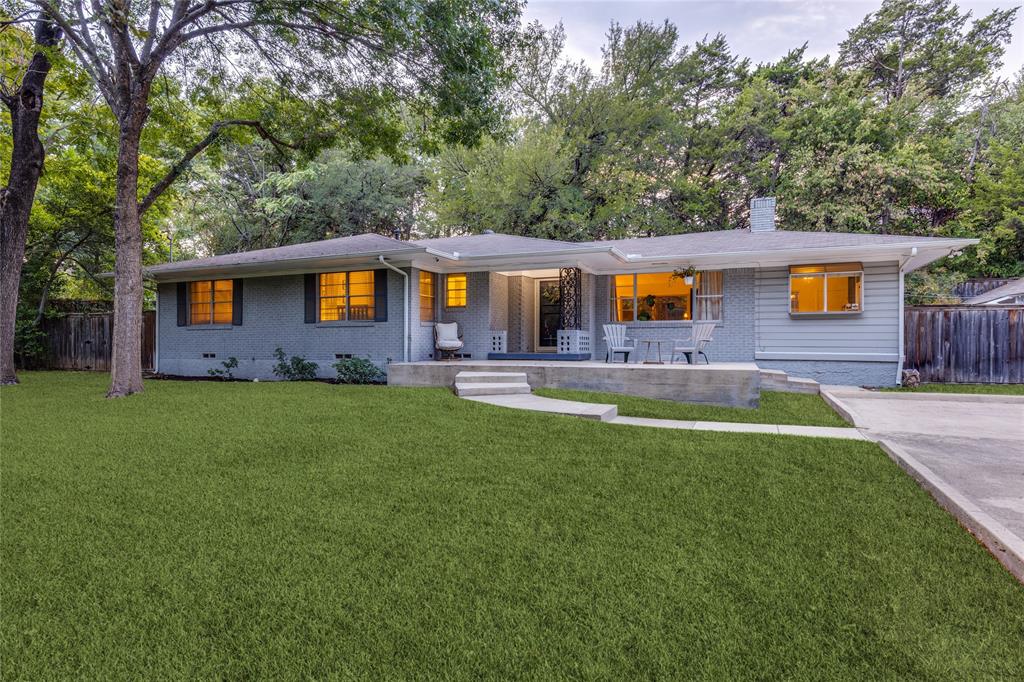 737 North Hampton Road Dallas, TX 75208 - Photo 6 of 30 A home with a strong response to the land—architecture and landscape feel inseparable here.