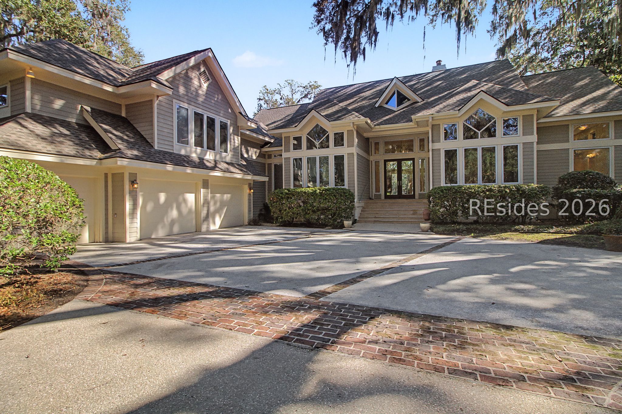 88 Inverness Drive Bluffton, SC 29910 - Photo 3 of 47 Front view showing two car + golf cart garage.