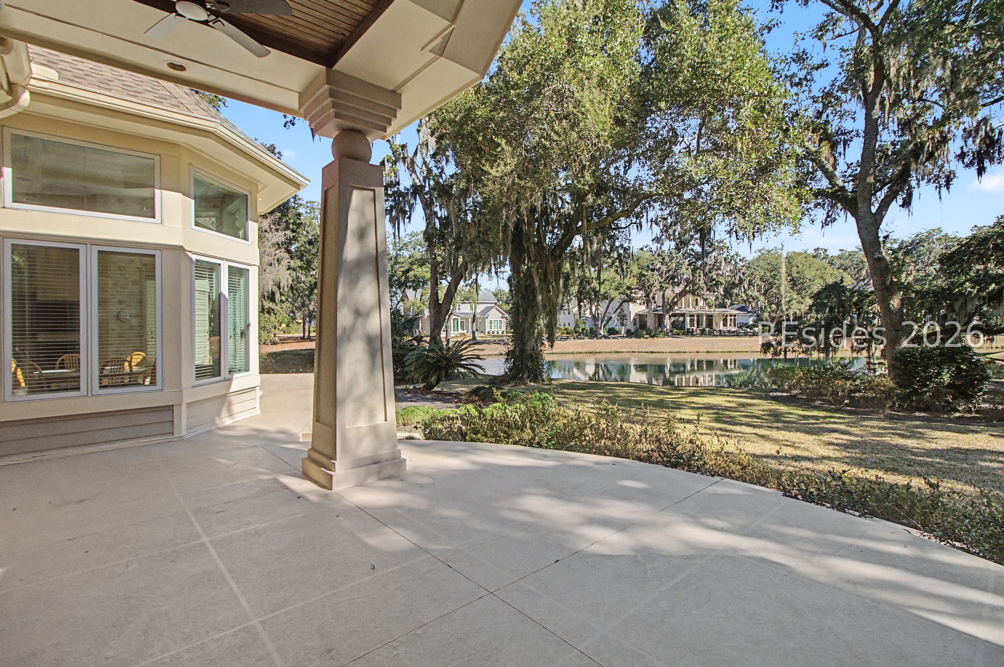88 Inverness Drive Bluffton, SC 29910 - Photo 41 of 47 Huge patio overlooking lagoon and green.