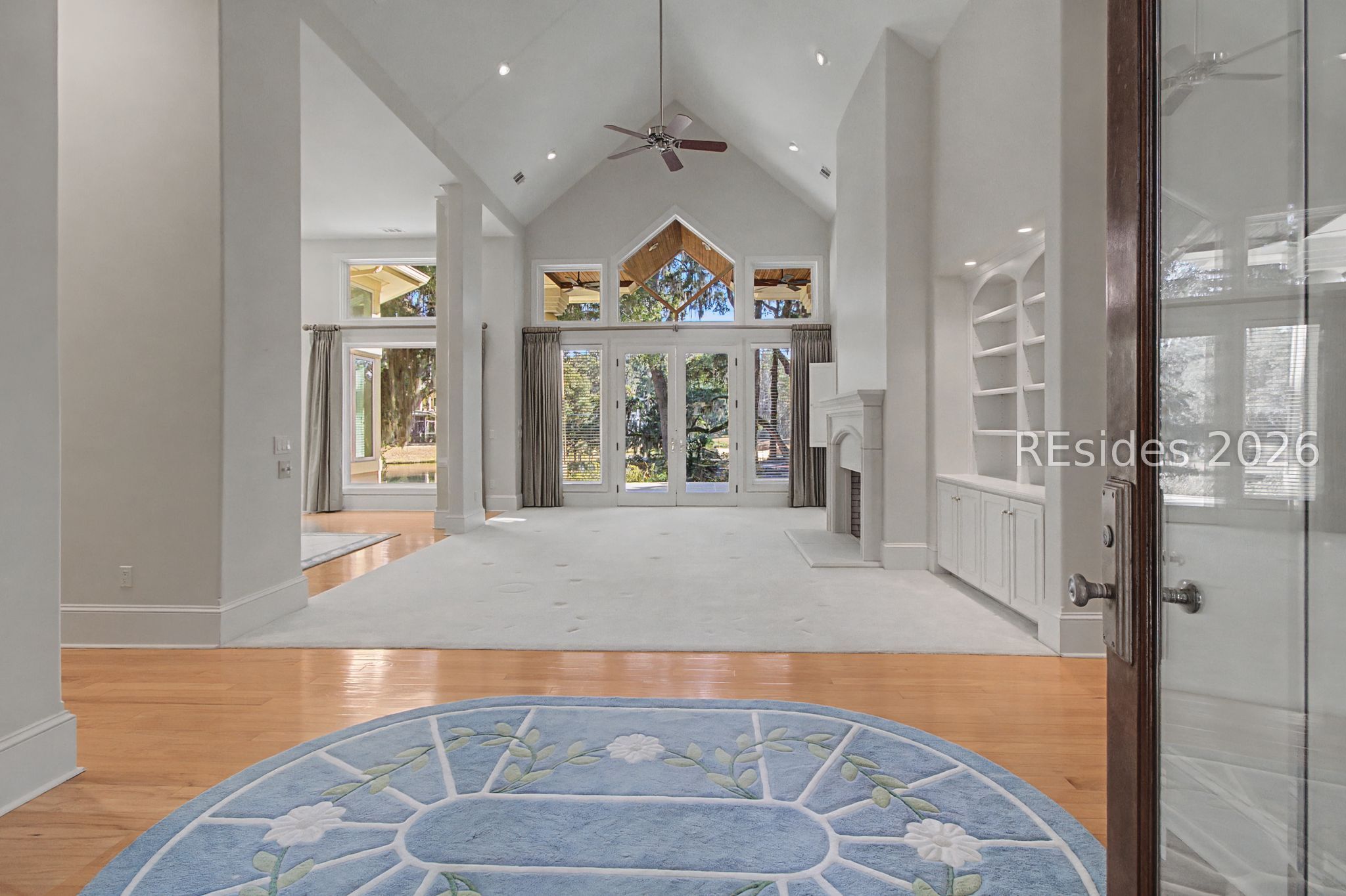 88 Inverness Drive Bluffton, SC 29910 - Photo 6 of 47 Living rm, vaulted ceilings & lagoon/golf views