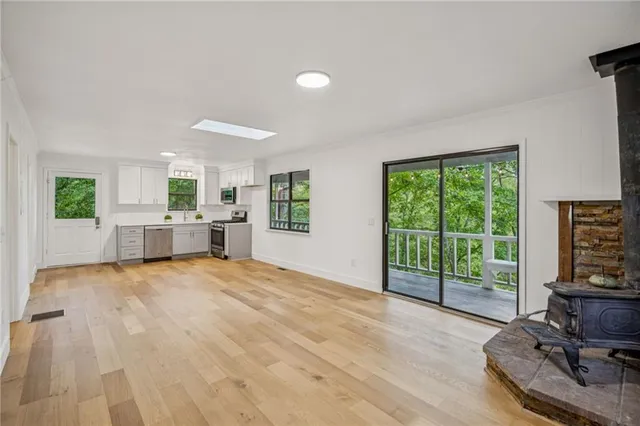 a view of balcony with wooden floor