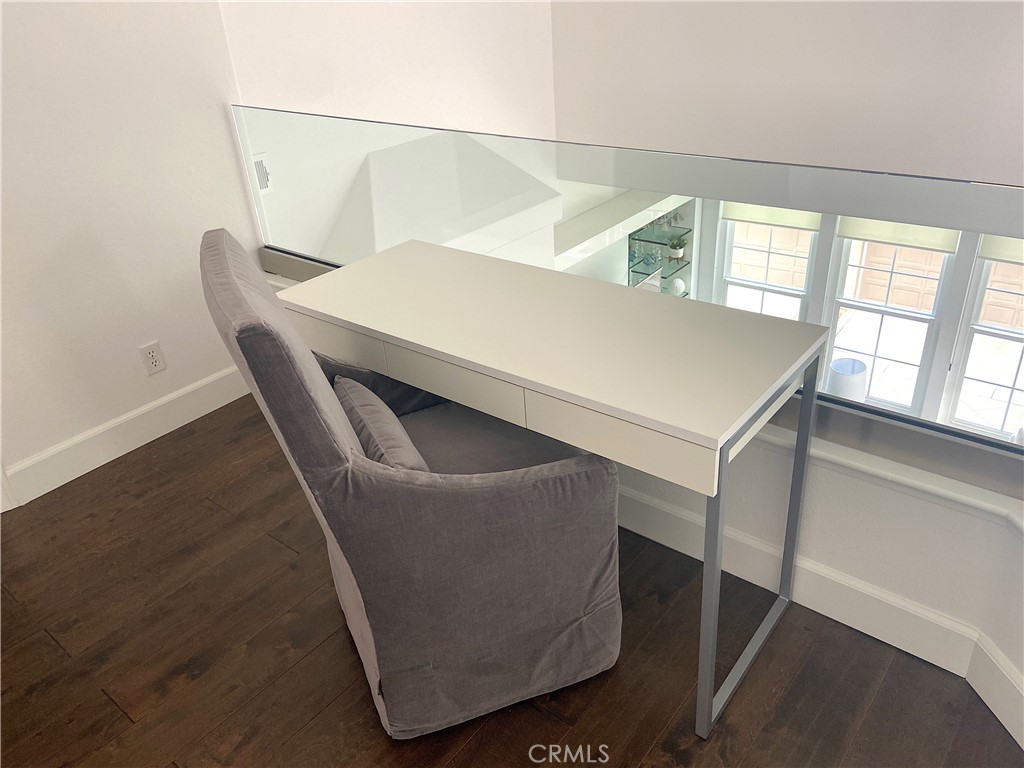 40 Anjou Newport Coast, CA 92657 - Photo 14 of 33 a living room with chairs and a table