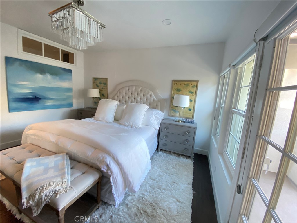 40 Anjou Newport Coast, CA 92657 - Photo 16 of 33 a bedroom with a bed and a window