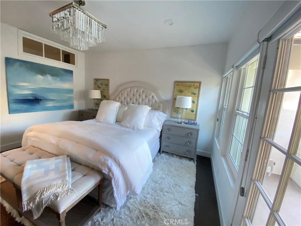 40 Anjou Newport Coast, CA 92657 - Photo 17 of 33 a bedroom with a bed and a window