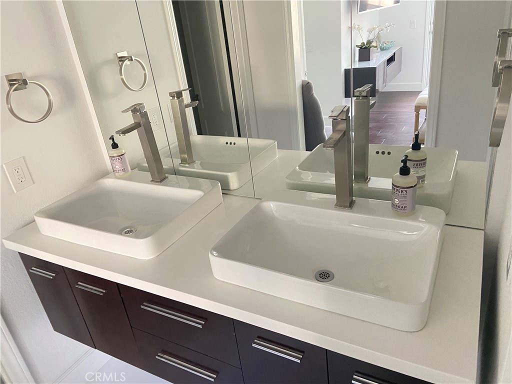 40 Anjou Newport Coast, CA 92657 - Photo 19 of 33 a bathroom with a sink and a mirror