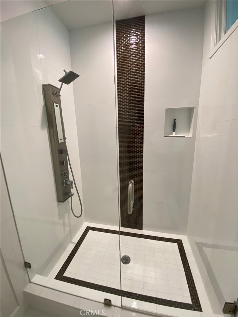 40 Anjou Newport Coast, CA 92657 - Photo 20 of 33 a bathroom with a shower