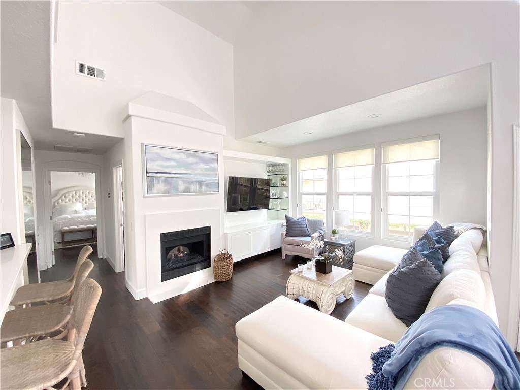 40 Anjou Newport Coast, CA 92657 - Photo 2 of 33 a living room with furniture fireplace and window
