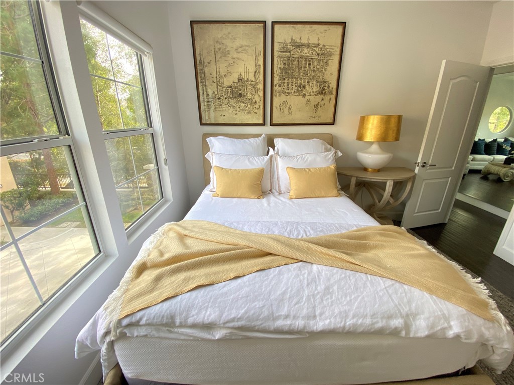40 Anjou Newport Coast, CA 92657 - Photo 22 of 33 a bed sitting in a bedroom next to a window