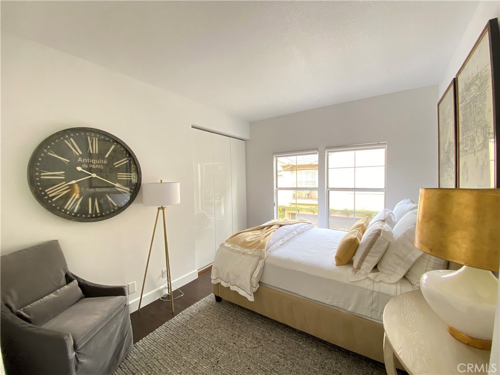 40 Anjou Newport Coast, CA 92657 - Photo 24 of 33 a bed sitting in a bedroom next to a window