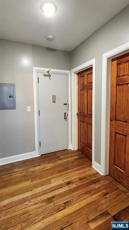 258 Franklin Street, Unit 1 Bloomfield, NJ 07003 - Photo 13 of 23 a view of an empty room with wooden floor