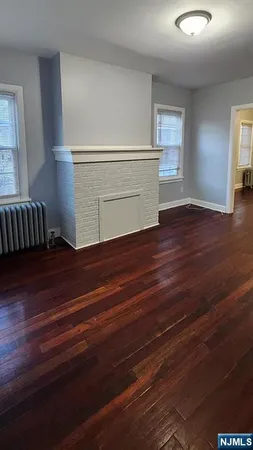 a view of livingroom with furniture and wooden floor