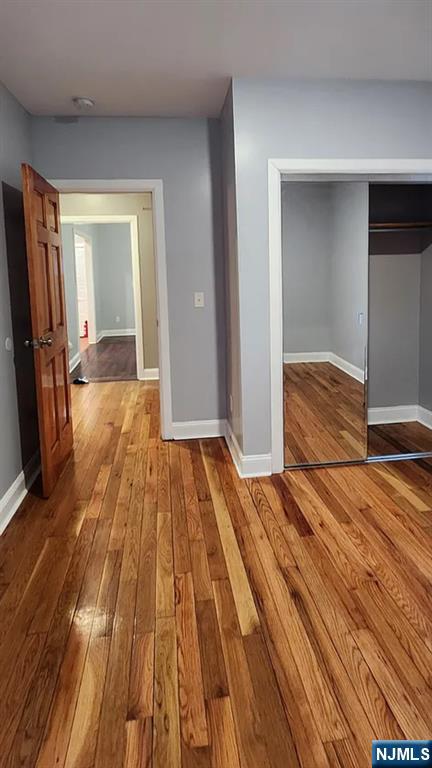 258 Franklin Street, Unit 1 Bloomfield, NJ 07003 - Photo 8 of 23 a view of empty room with wooden floor