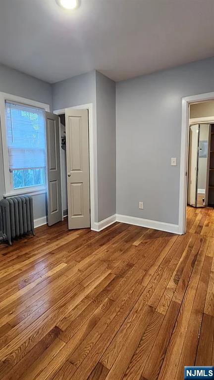 258 Franklin Street, Unit 1 Bloomfield, NJ 07003 - Photo 10 of 23 a view of a livingroom with wooden floor and closet