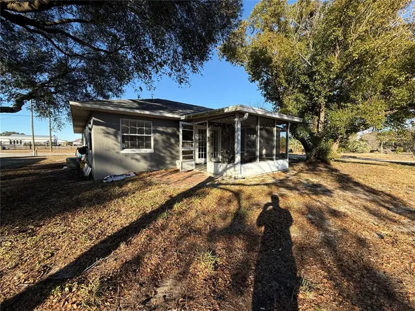 a view of a house with snow on the wall