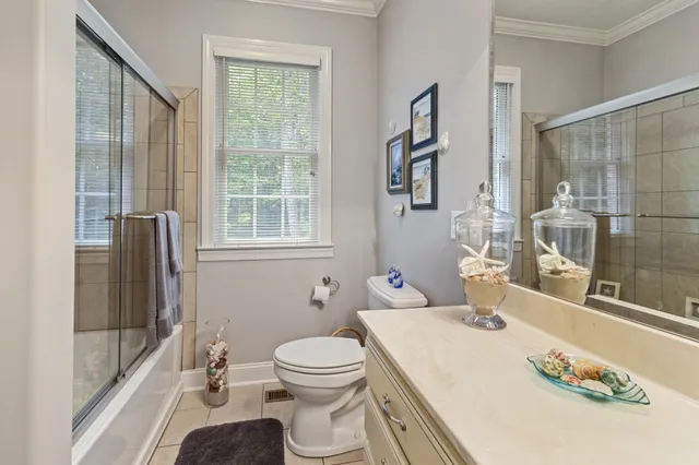 a utility room with sink dryer and washer