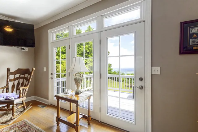 a bathroom with a shower sink and toilet