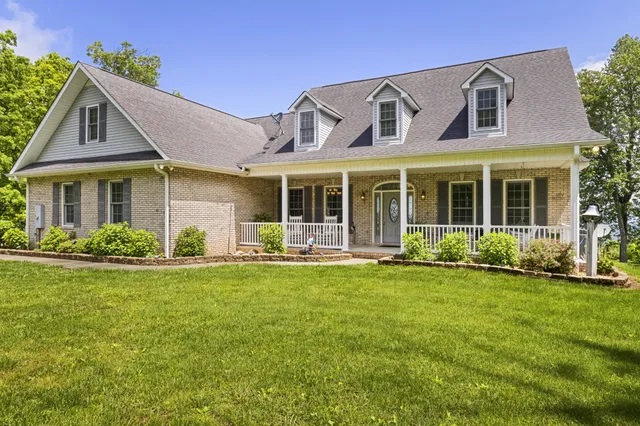 a view of a balcony with wooden floor