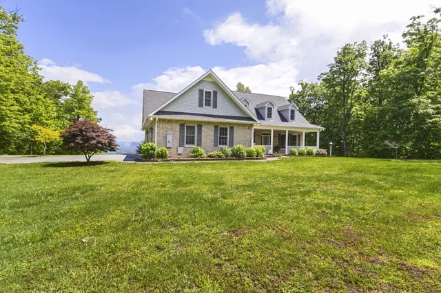 a view of a lake with a building in the background