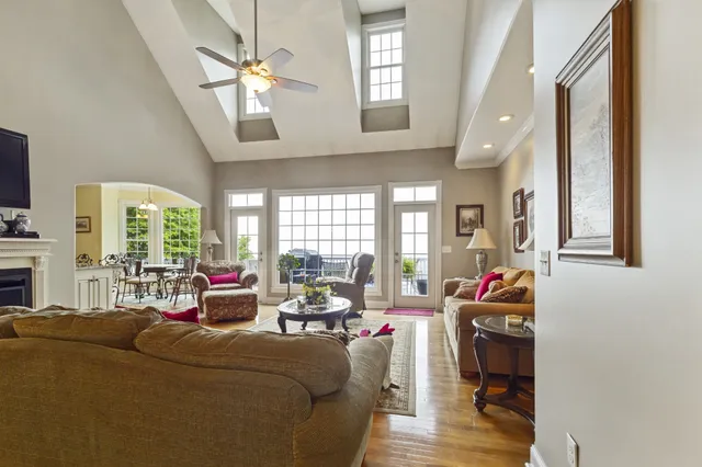 a living room with furniture and flat screen tv