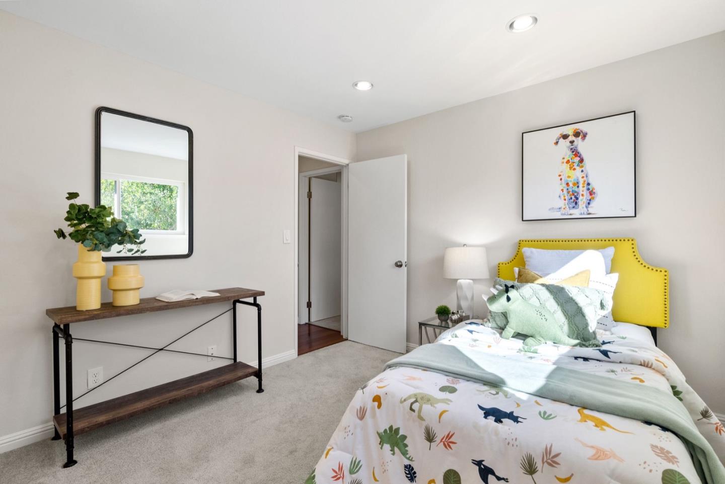 76 Jim Elder Drive Campbell, CA 95008 - Photo 22 of 37 a bedroom with a bed and a lamp on dresser