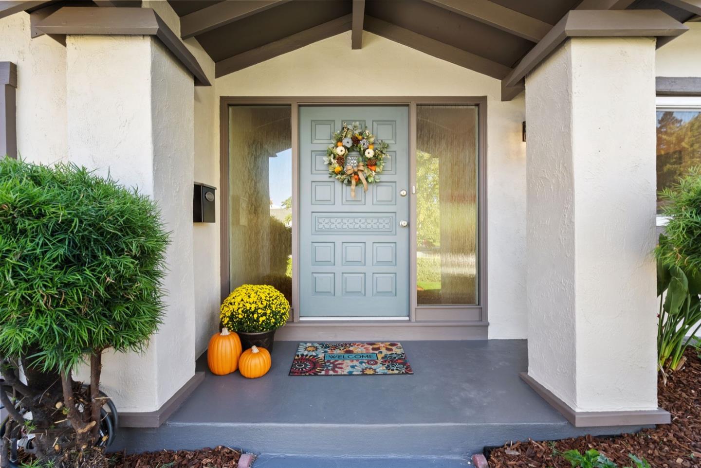 76 Jim Elder Drive Campbell, CA 95008 - Photo 3 of 37 a front view of a house with chairs