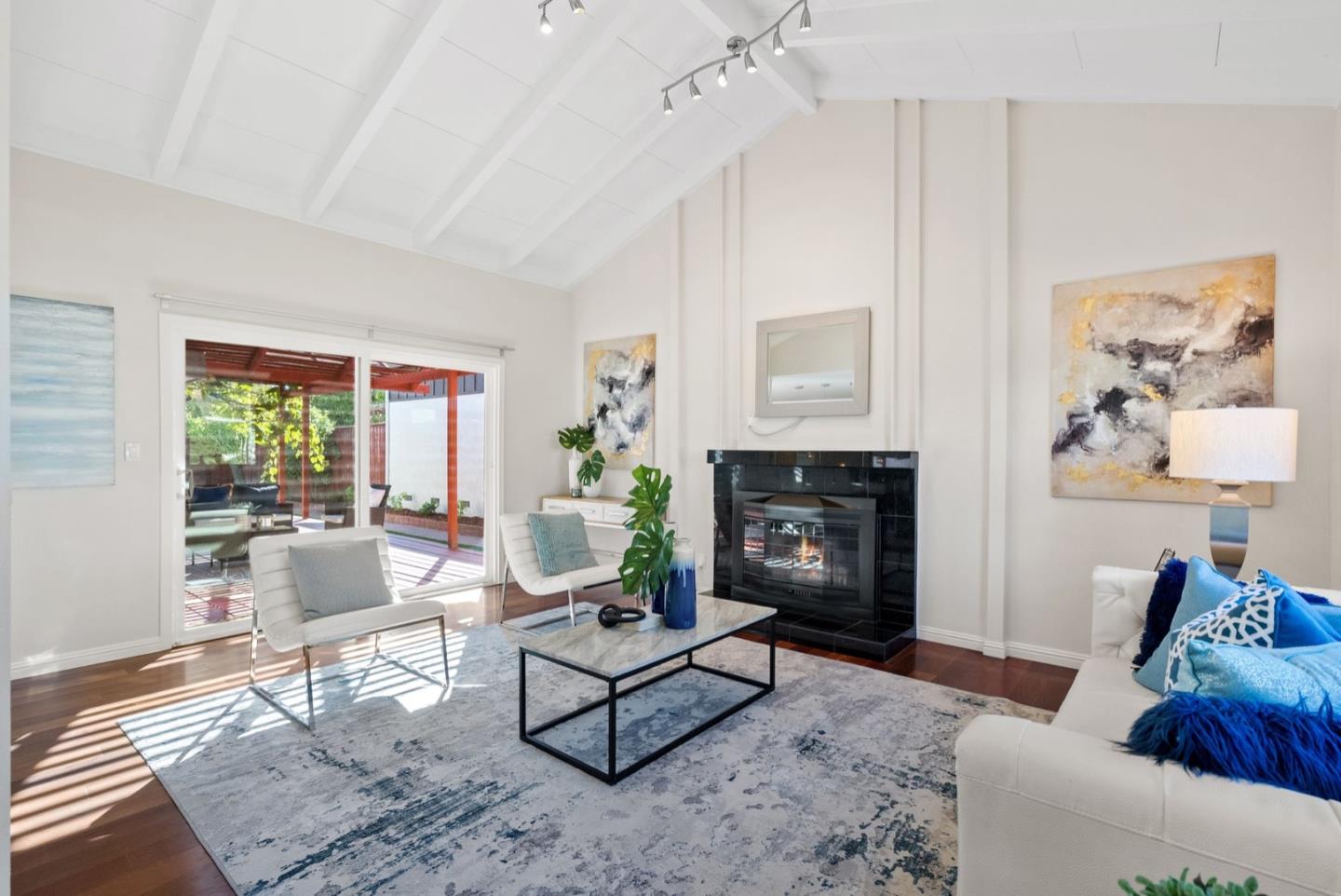 76 Jim Elder Drive Campbell, CA 95008 - Photo 5 of 37 a living room with furniture a fireplace and a window