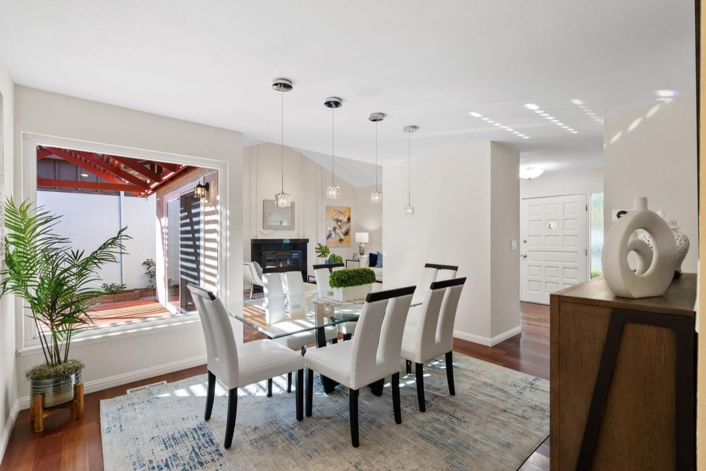 76 Jim Elder Drive Campbell, CA 95008 - Photo 7 of 37 a view of a dining room with furniture and wooden floor