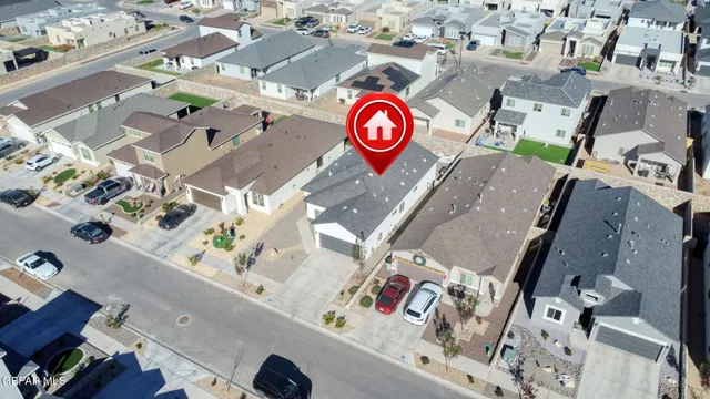 an aerial view of residential house with outdoor space