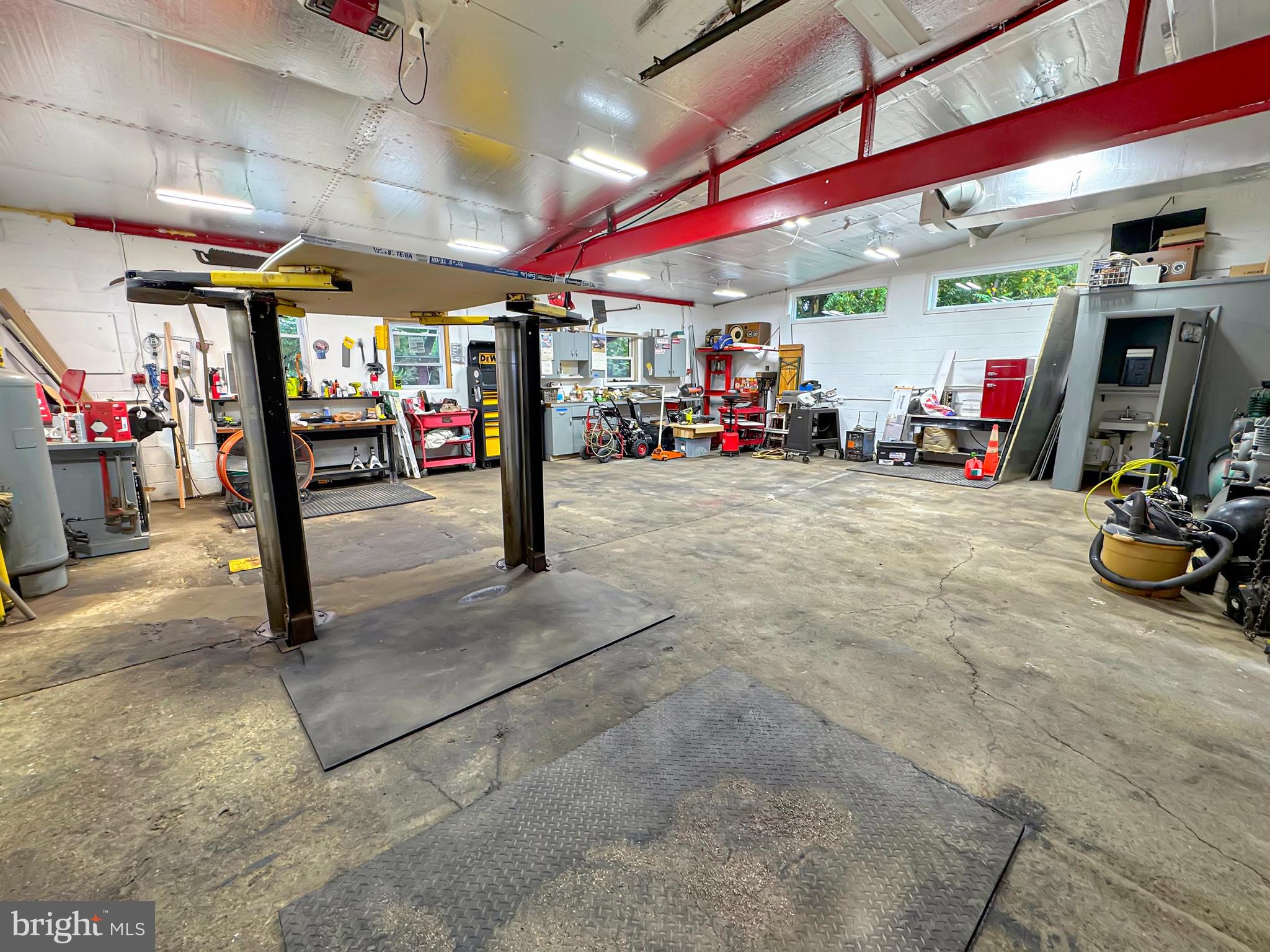 1027 Riverside Drive Pottstown, PA 19465 - Photo 21 of 24 a view of a garage with gym equipment