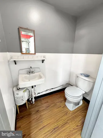 a bathroom with a sink and a toilet