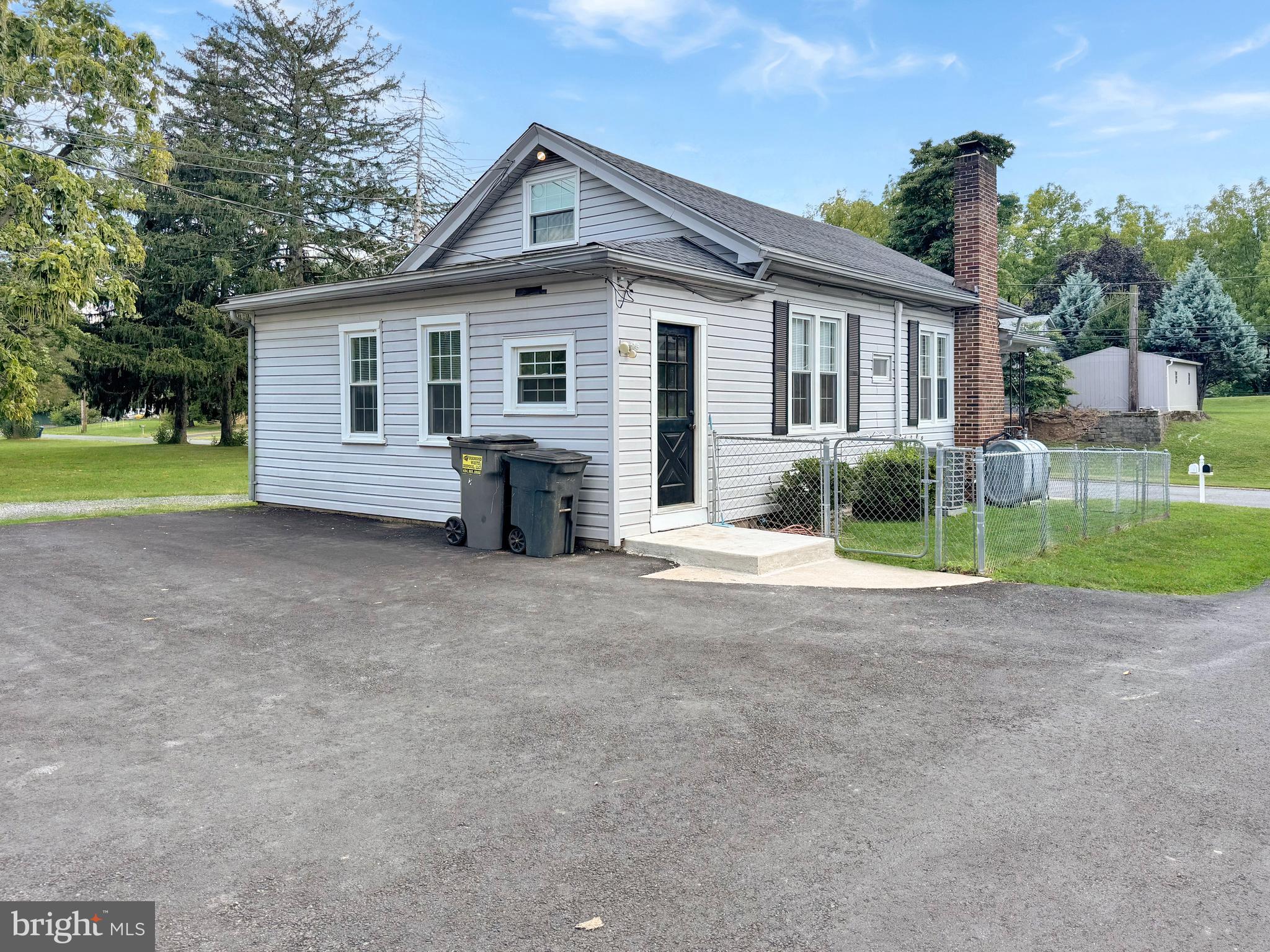 1027 Riverside Drive Pottstown, PA 19465 - Photo 3 of 24 a view of a house with backyard and garden