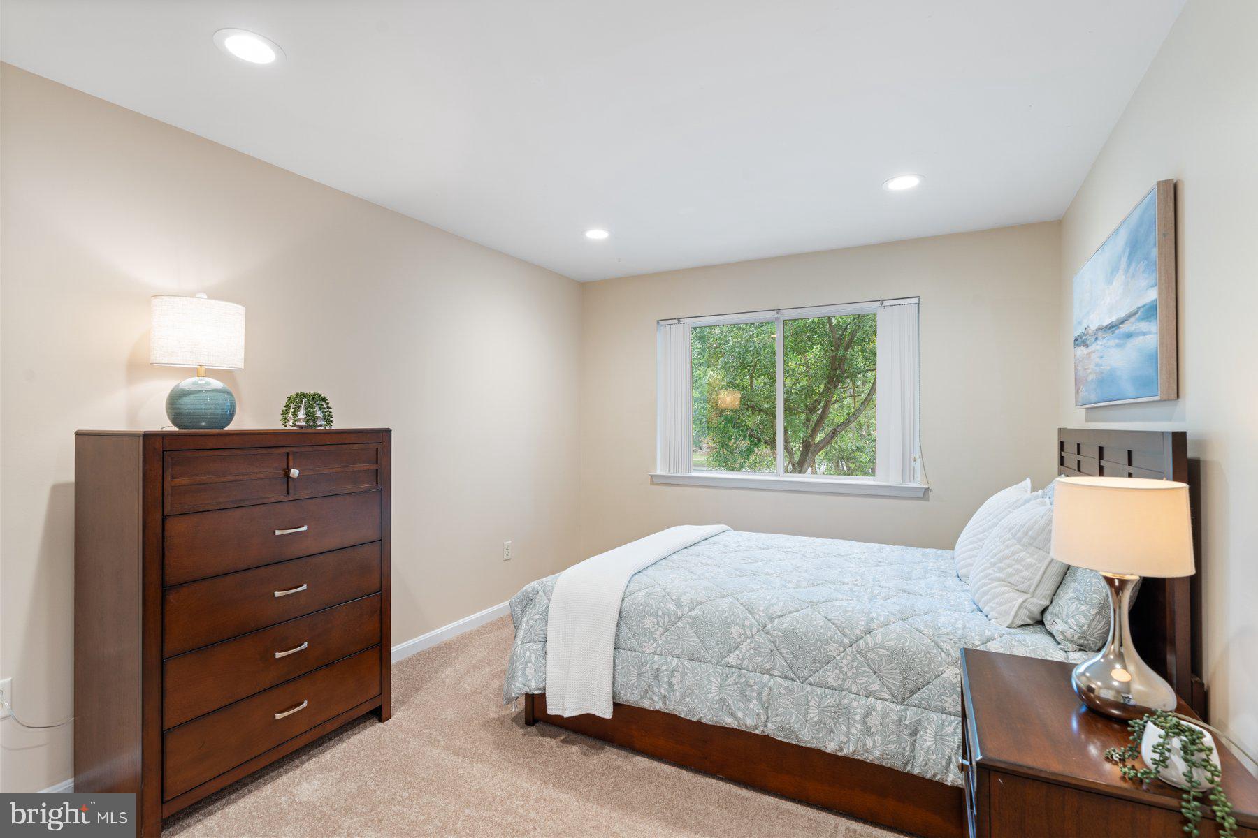 359 Valley Stream Road Severna Park, MD 21146 - Photo 26 of 55 a bedroom with a bed and a window